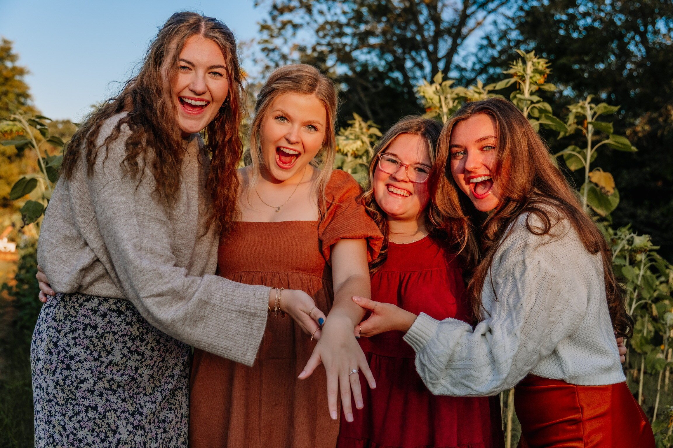 Excited friends after girl gets engaged