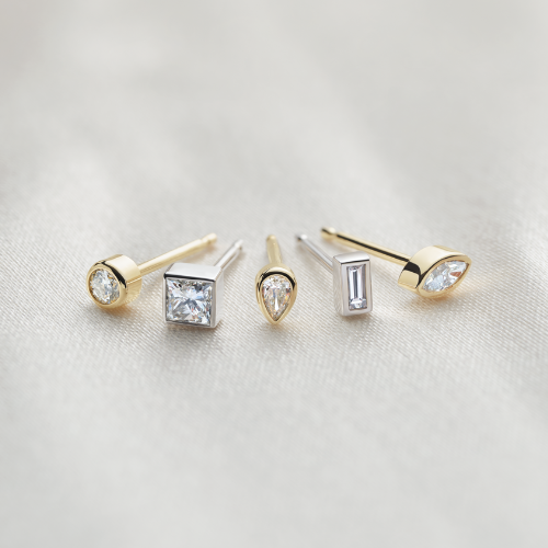 Yellow Gold and White Gold (or Platinum) Bezel Set Earrings in Various Diamond Cuts