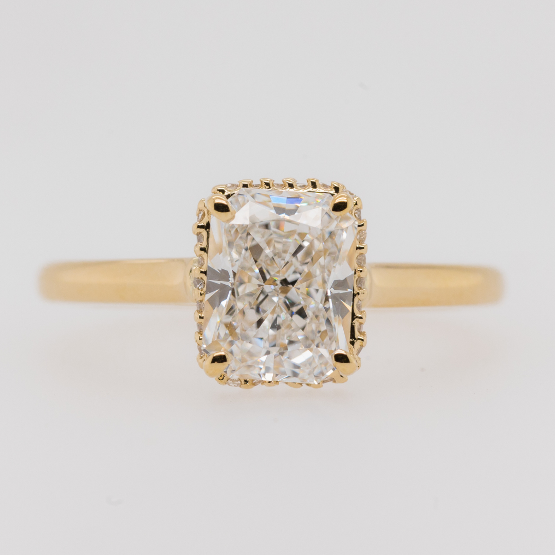 radiant cut diamond engagement ring with hidden halo