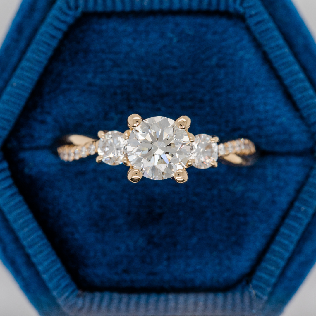 round diamond engagement ring twisted band yellow gold