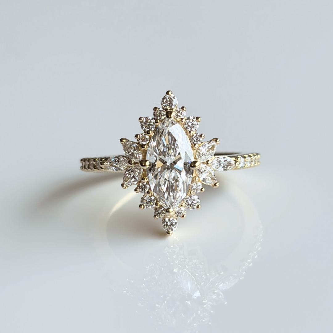 marquise cut diamond engagement ring accented halo style vintage inspired