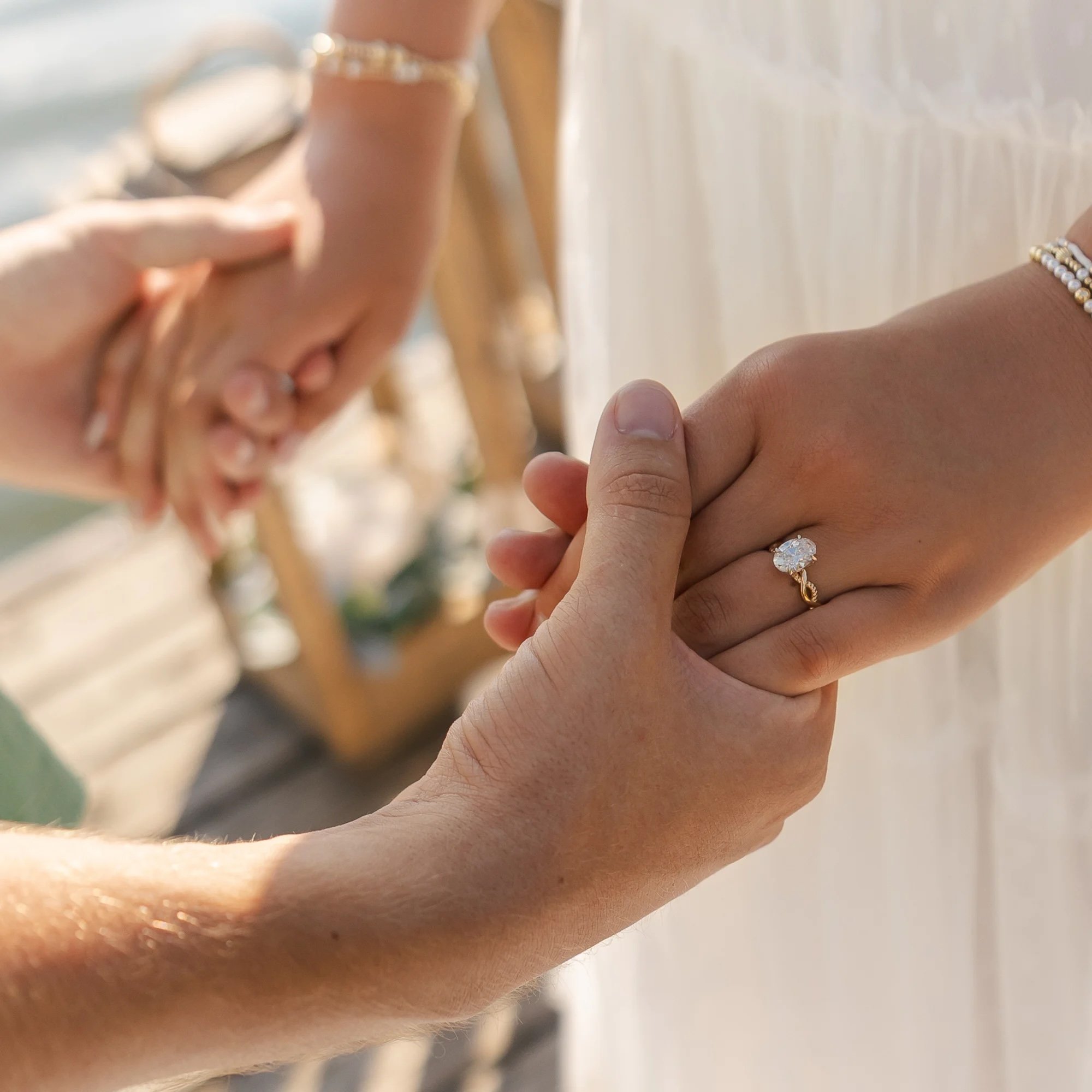 Couple_Engagement_Holding_Hands