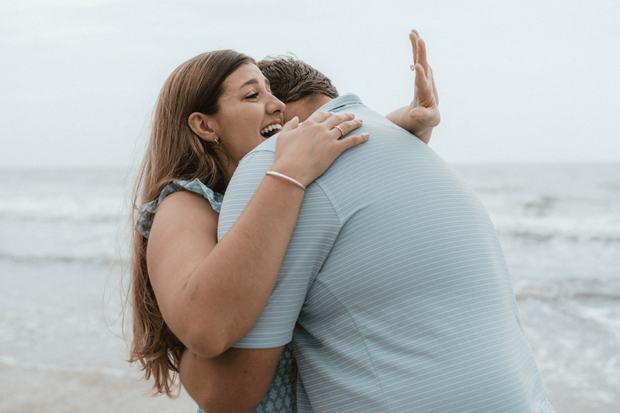Couple_Getting_Engaged_with_Faithful_Platform_Ring_at_Beach