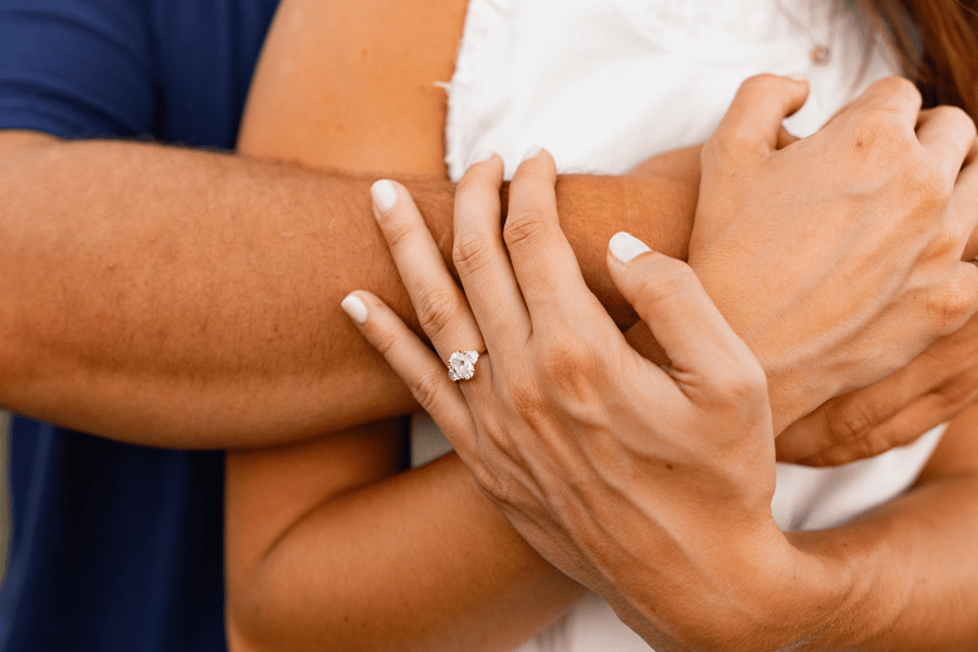 Couple_Getting_Engaged_with_Three_Stone_Faithful_Platform_Ring