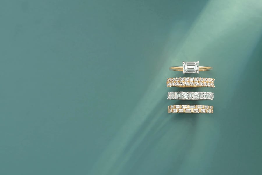 East_to_West_Emerald_Engagement_Ring_with_Complimenting_Diamond_Bands
