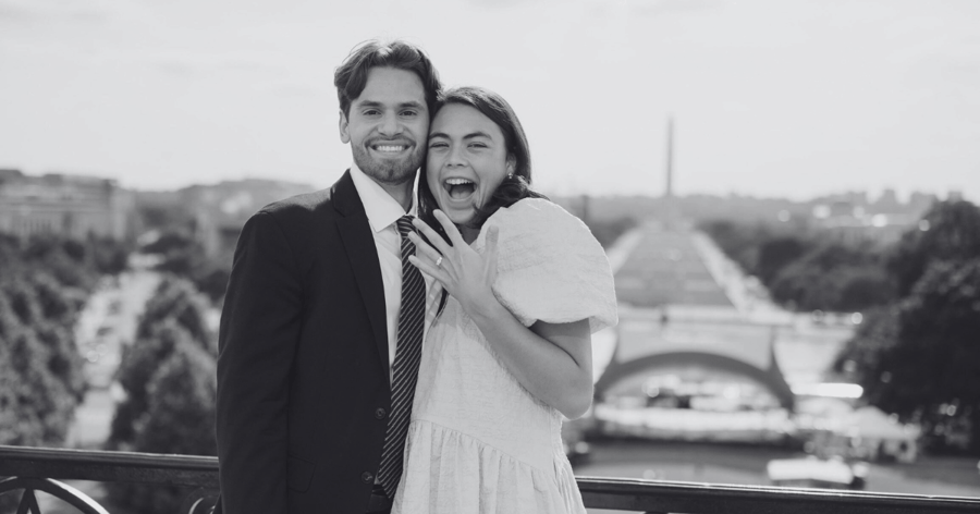 Newly_Happy_Engaged_Couple_Showing_Off_Engagement_Ring