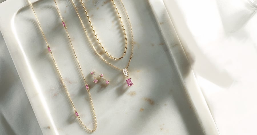 Various_Yellow_Gold_Necklaces_and_Earrings_with_Pink_Gemstones