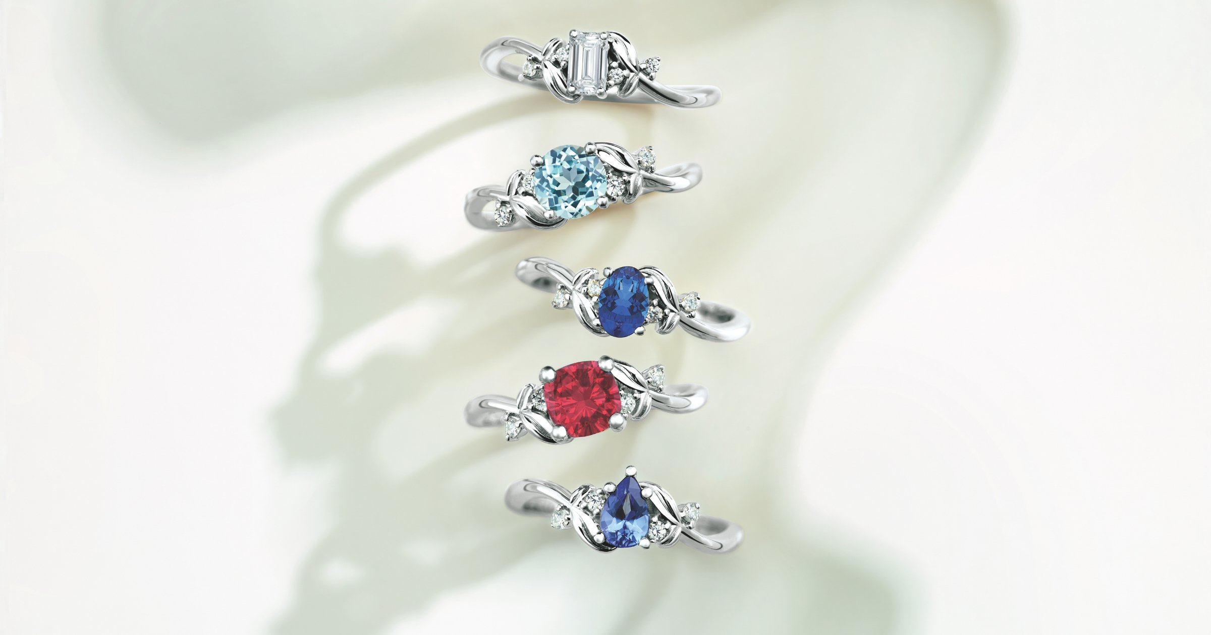 White Gold (or Platinum) Accented Engagement Rings set with Various Colored Gemstones