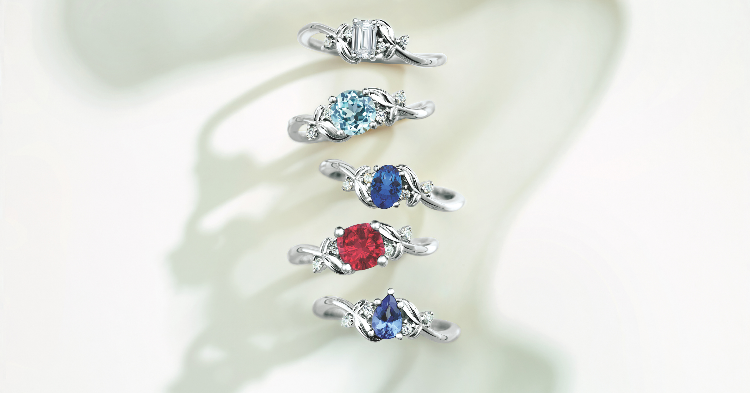 White Gold (or Platinum) Accented Engagement Rings set with Various Colored Gemstones