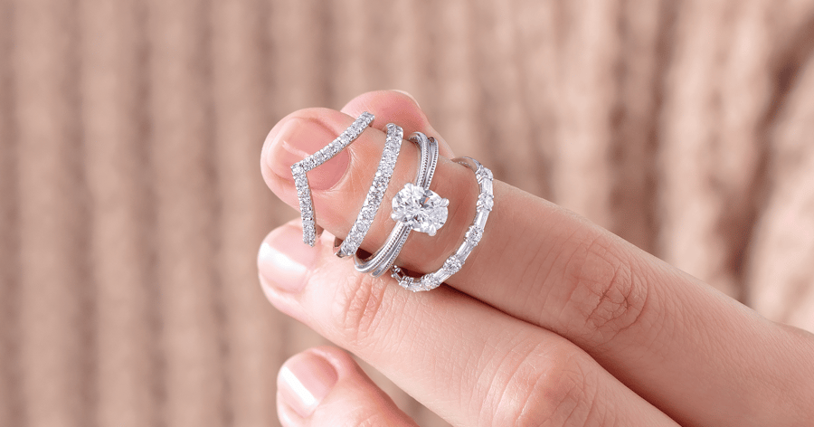 White Gold (or Platinum) Contour Wedding Band with DWhite Gold (or Platinum) Solitaire Engagement Ring with Detailed Shank set with an Oval Cut Diamond; Various White Gold (or Platinum) Wedding Band with Diamond Accents