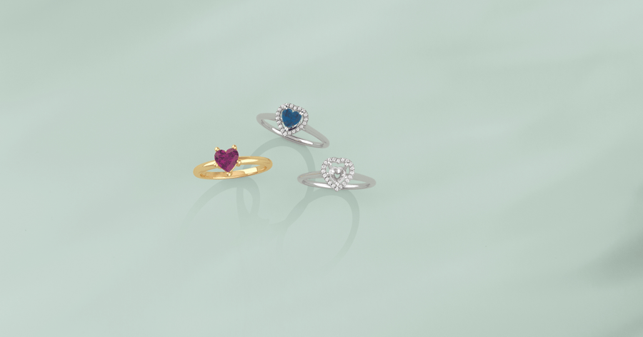 Yellow Gold Ring set with a Heart Cut Magenta Stone; White Gold (or Platinum) Diamond Halo Ring set with a Heart Cut Blue Stone; White Gold (or Platinum) Diamond Halo Ring Mounting for a Heart Cut Stone