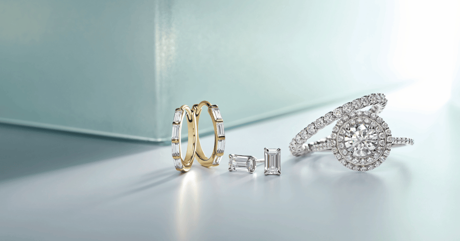 Yellow_gold_baguette_huggies_baguette_studs_double_halo_engagement_ring_with_matching_accented_wedding_band