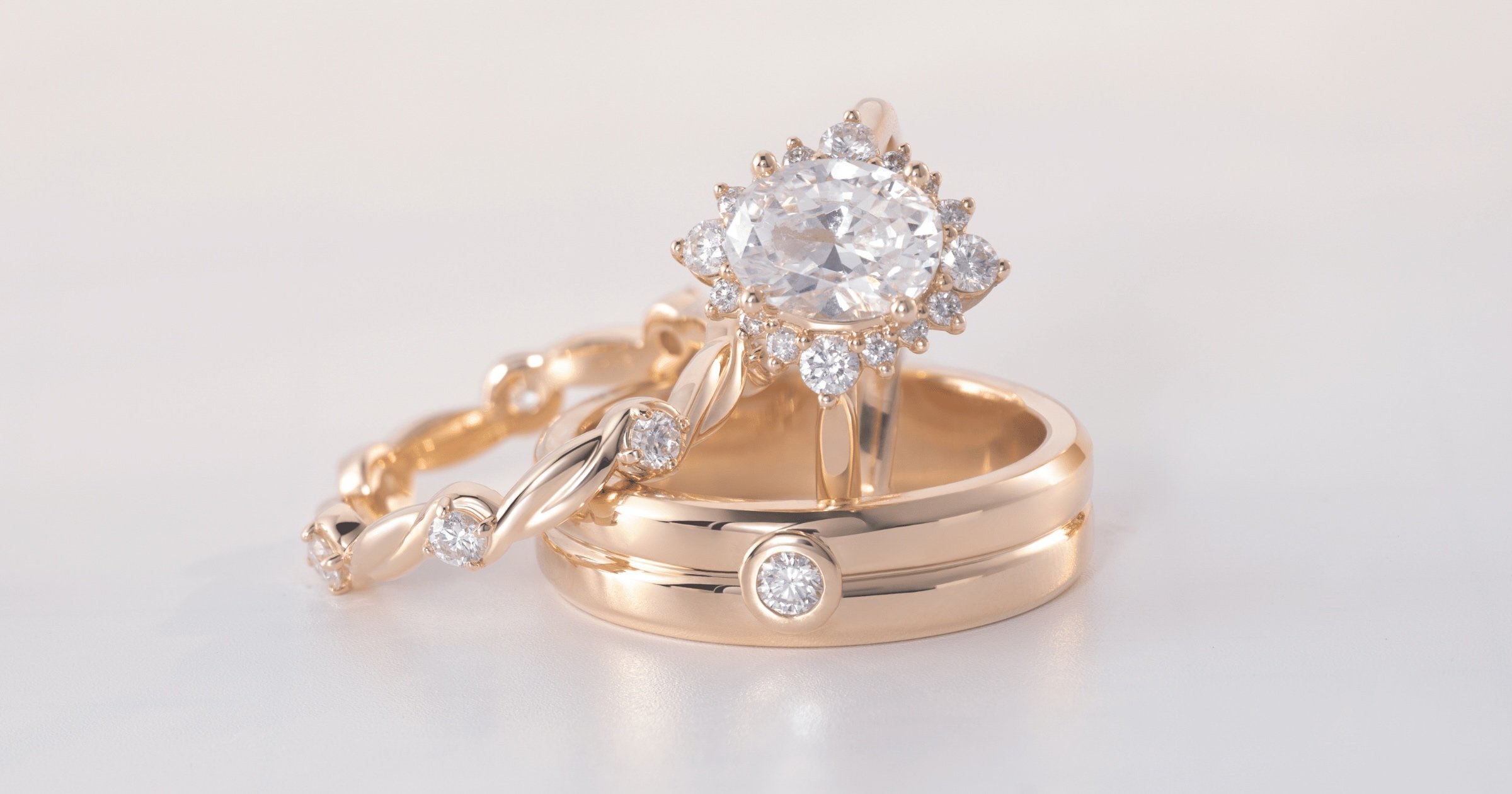Rose Gold Diamond Halo Engagement Ring set with an Oval Cut Diamond Womens Rose Gold Wedding Band with Diamond Accents Mens Rose Gold Wedding Band with Diamond Accent