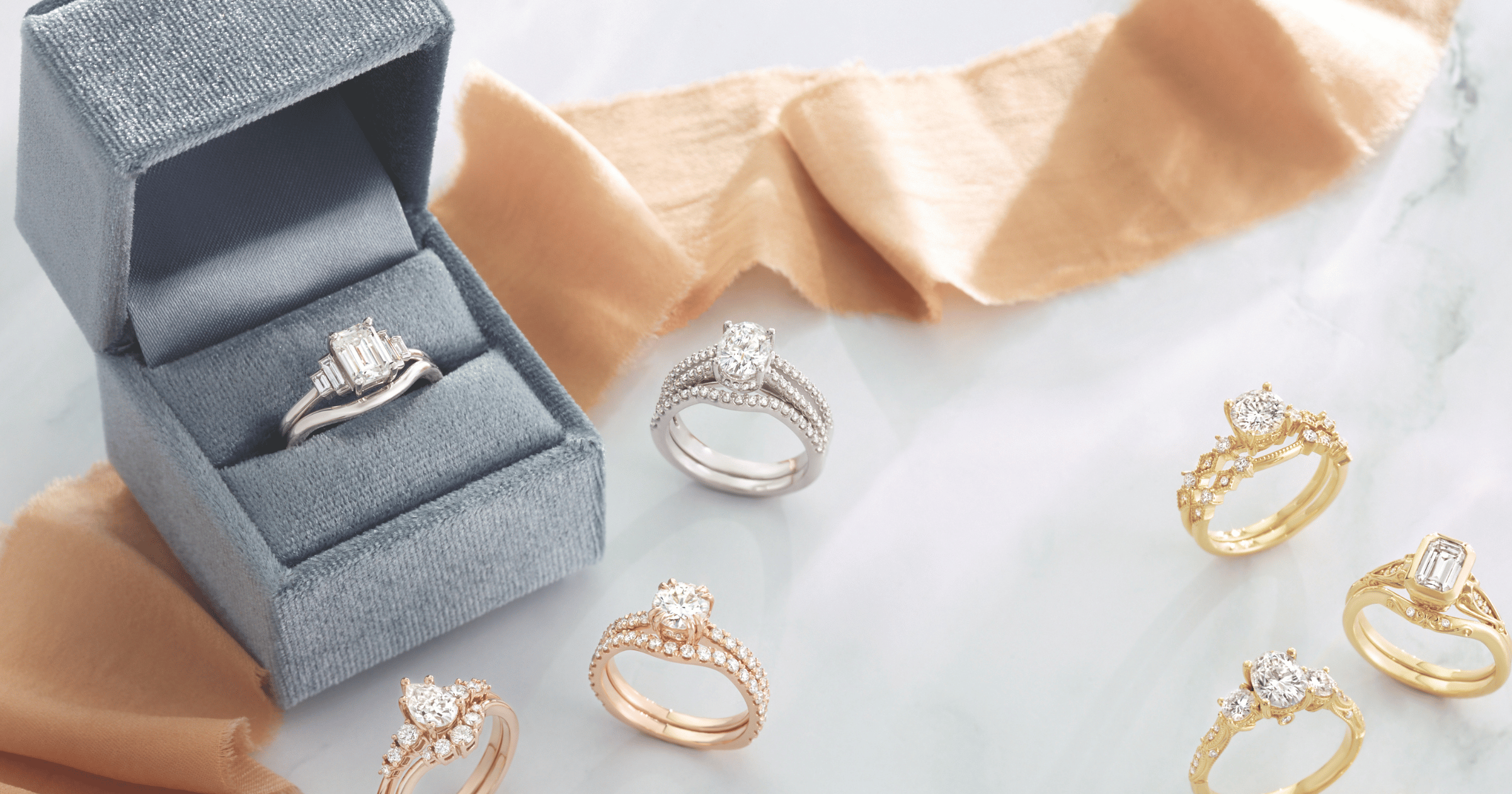 Various_yellow_gold_rose_gold_and_white_gold_(or)_platinum_engagement_rings_and_matching_wedding_bands