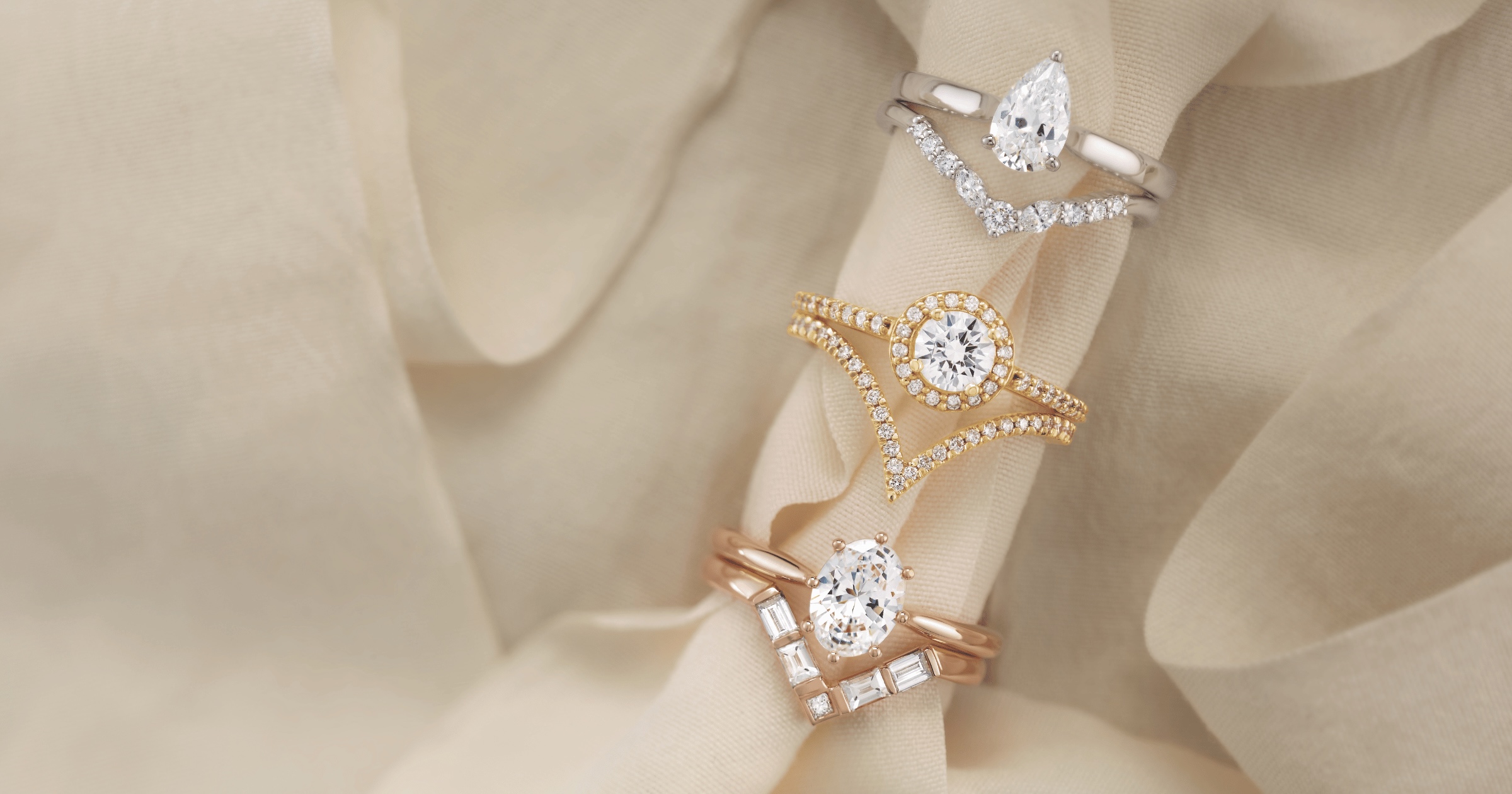 Yellow White and Rose Gold Engagement Rings with Accenting Diamonds and Complimenting Wedding Bands